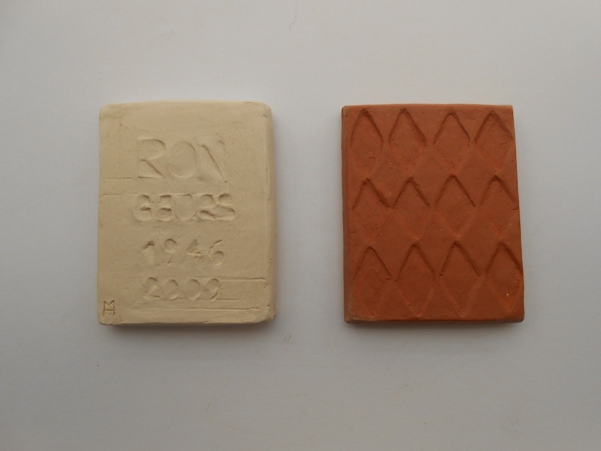 medal, clay two colours